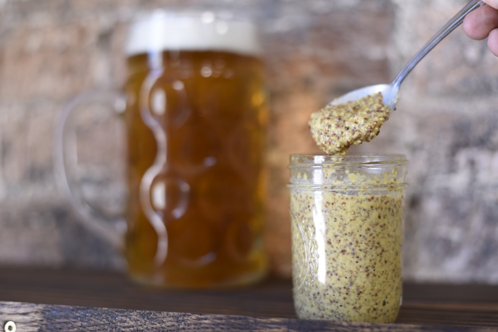 clear glass jar filled with brown liquid