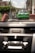 A green and white taxi drives down a rustic street with buildings and palm trees lining the sides. The image is viewed through a car windshield with a blurred dashboard in the foreground. It appears to be a bright day with a clear sky.