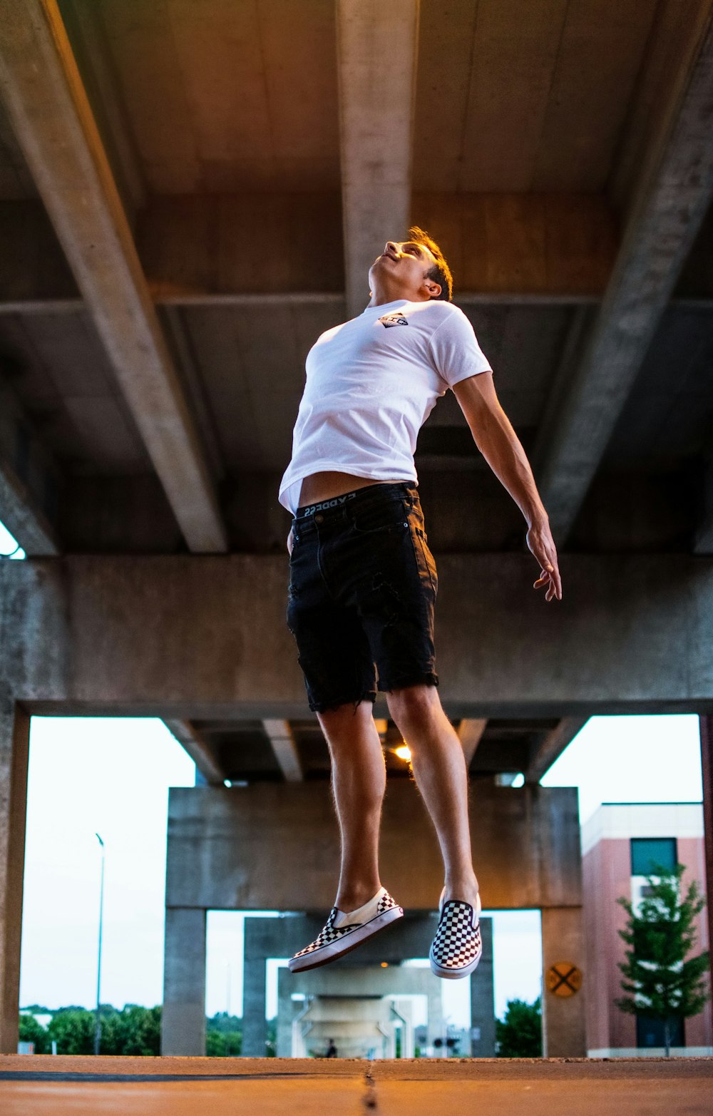 man jumping during daytime