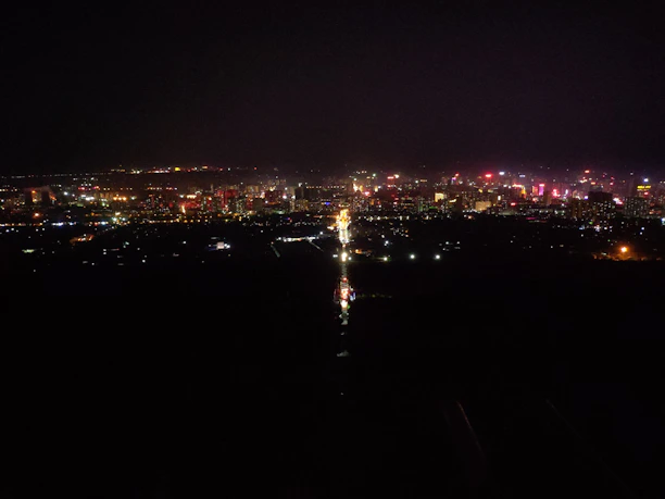 A vibrant cityscape at night symbolizing exciting and spontaneous encounters.