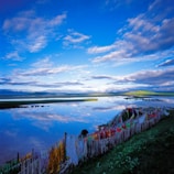 Smiling faces during a morning prayer session by the lake