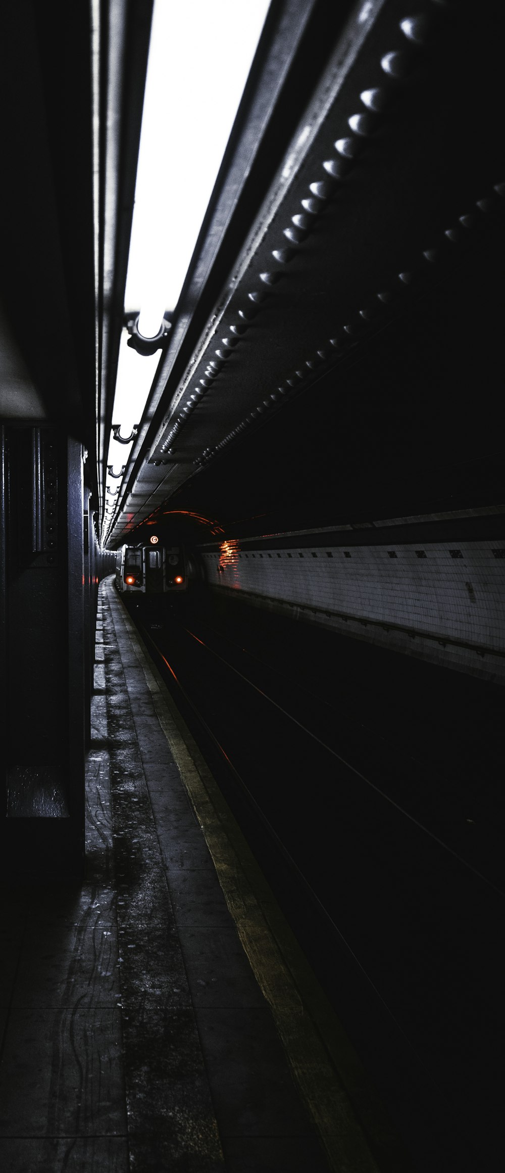 train passing on tunnel