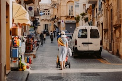 woman standing near white vehicle