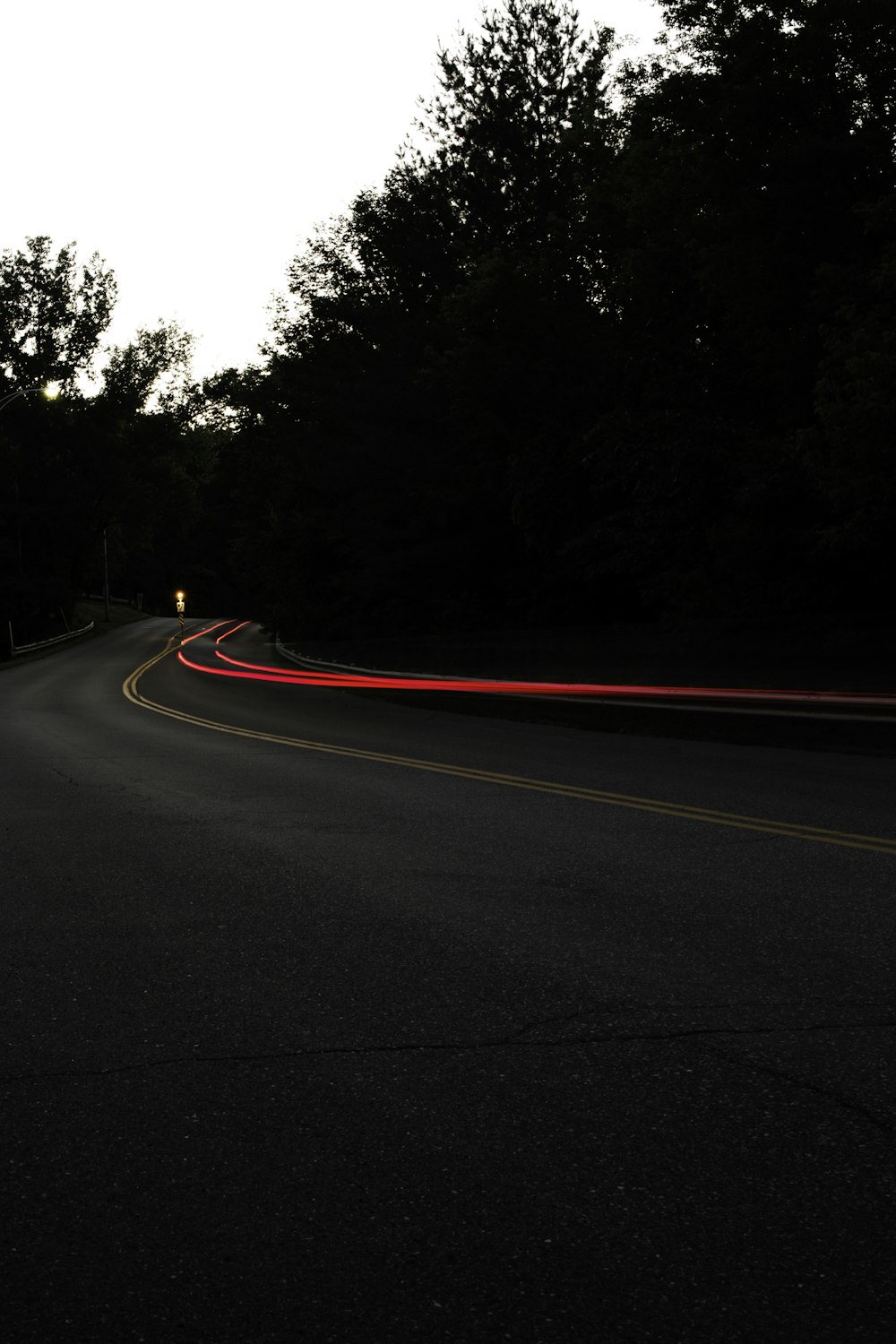 concrete road with cars passing