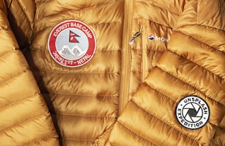 yellow and red zip-up bubble jacket