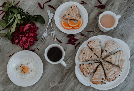 sliced cake and orange fruits
