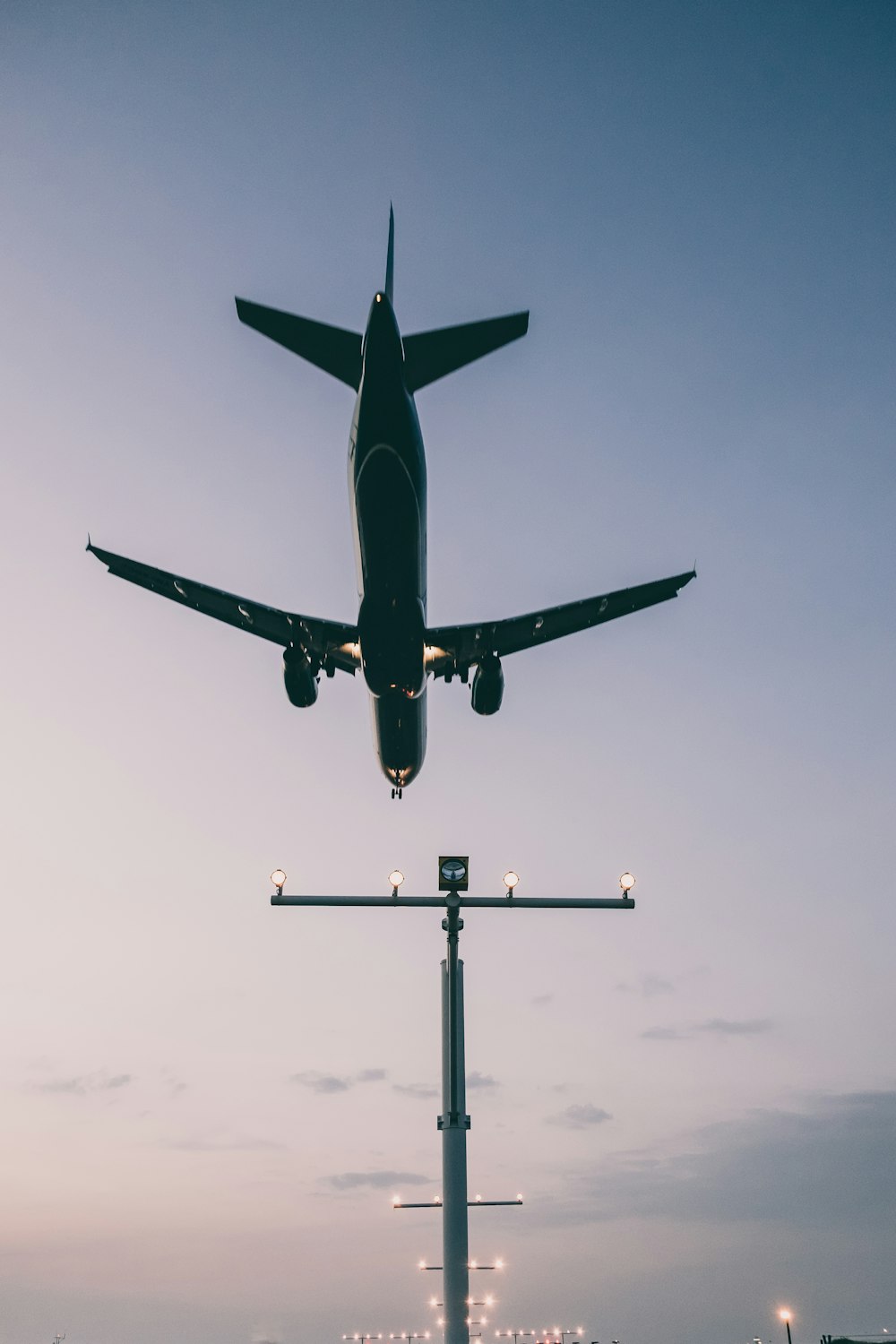 low angle photo of flying airplane