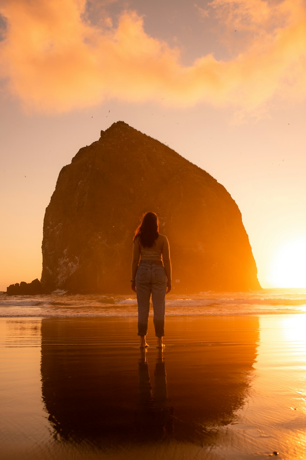 woman standing on seashore