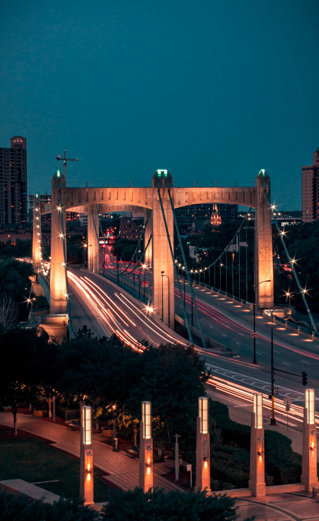 brown bridge during daytime time lapse photography