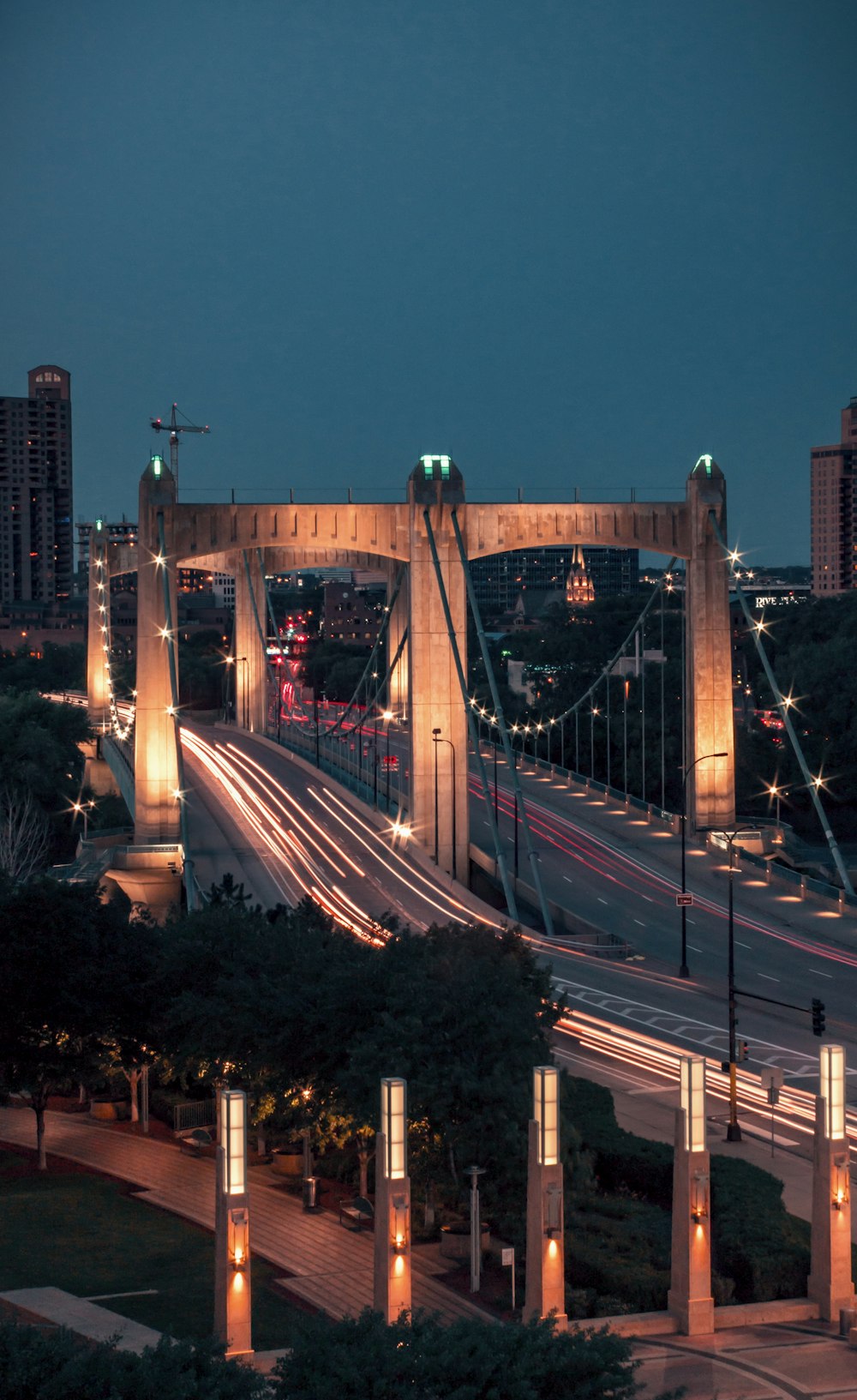 brown bridge during daytime time lapse photography