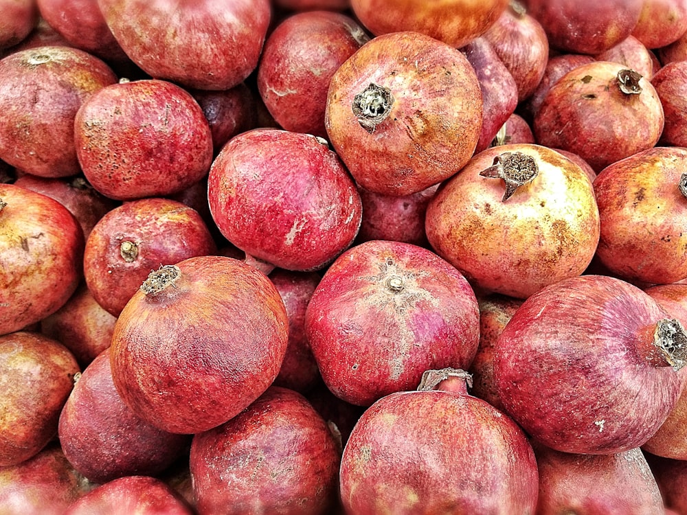 pile of red pomegranate fruits