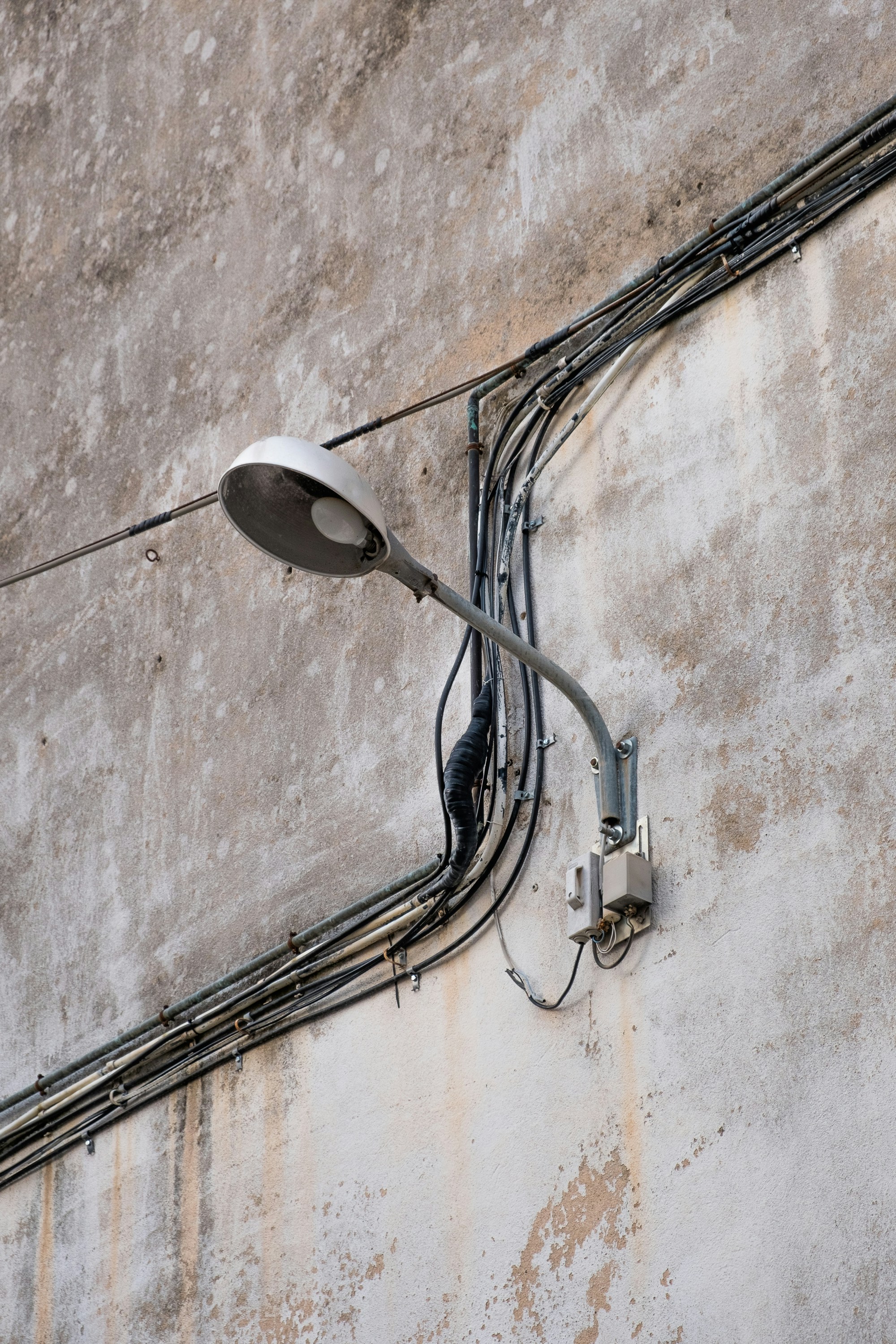 gray wall-mount electric lamp