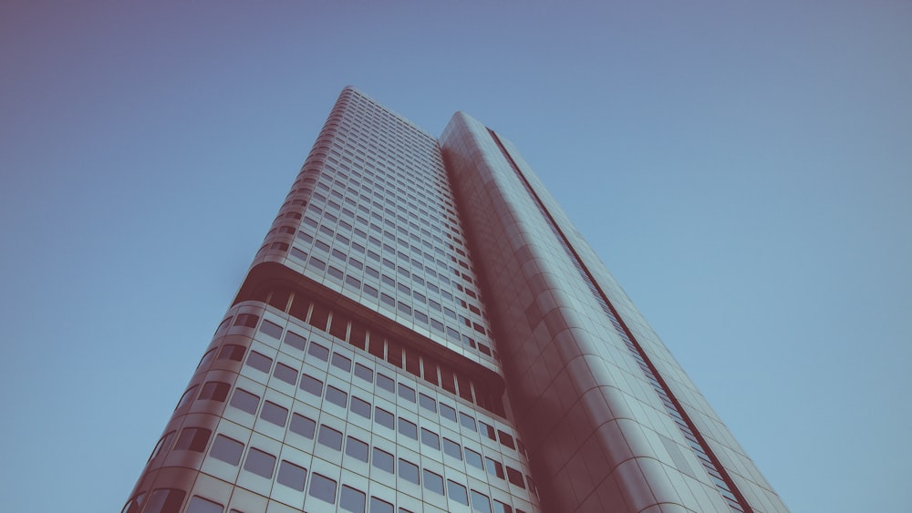 low angle photography of building under blue skies