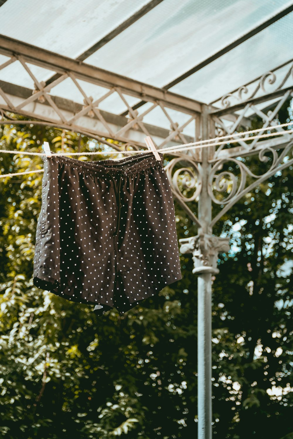hanging black and white polka-dot shorts