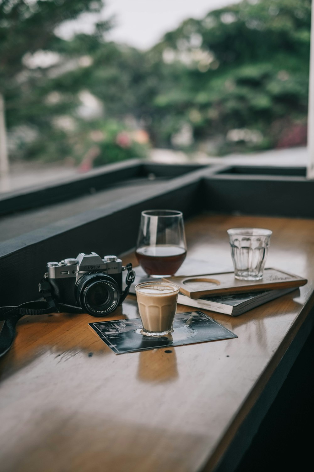 black camera on brown table