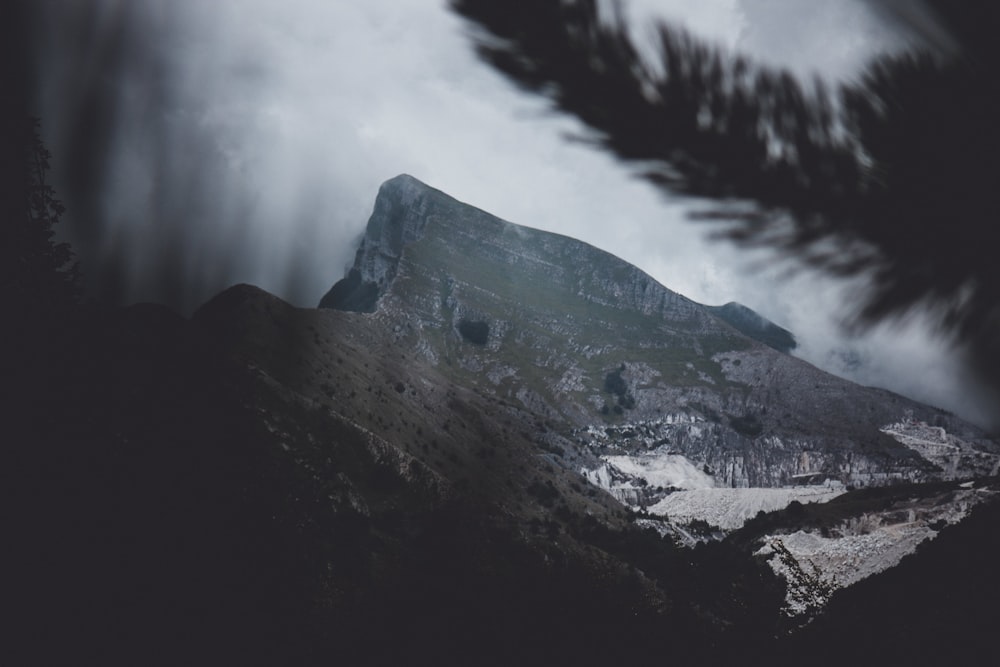 mountain under white sky during daytime