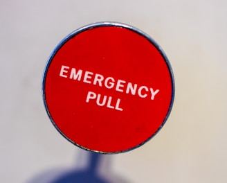 red Emergency Pull lever