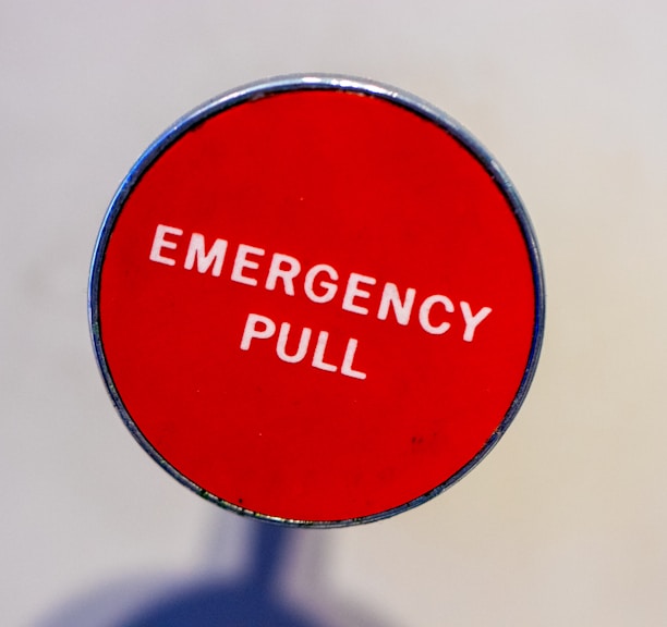 red Emergency Pull lever