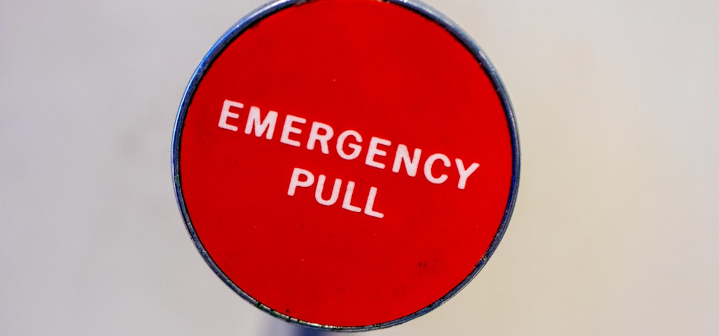 red Emergency Pull lever