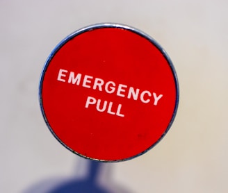 red Emergency Pull lever
