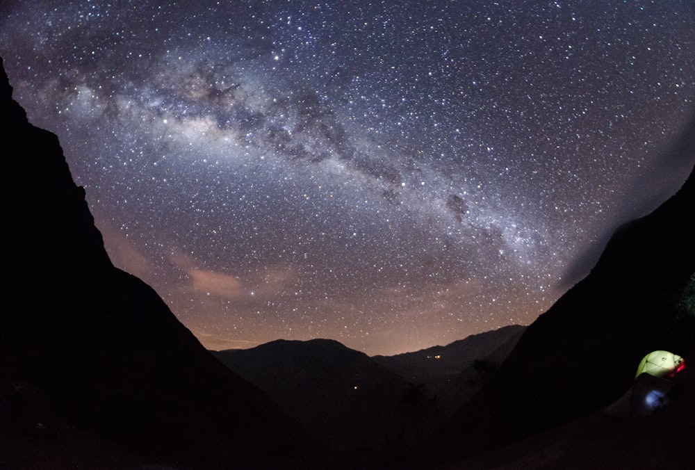 milky way over mountain wallpaper