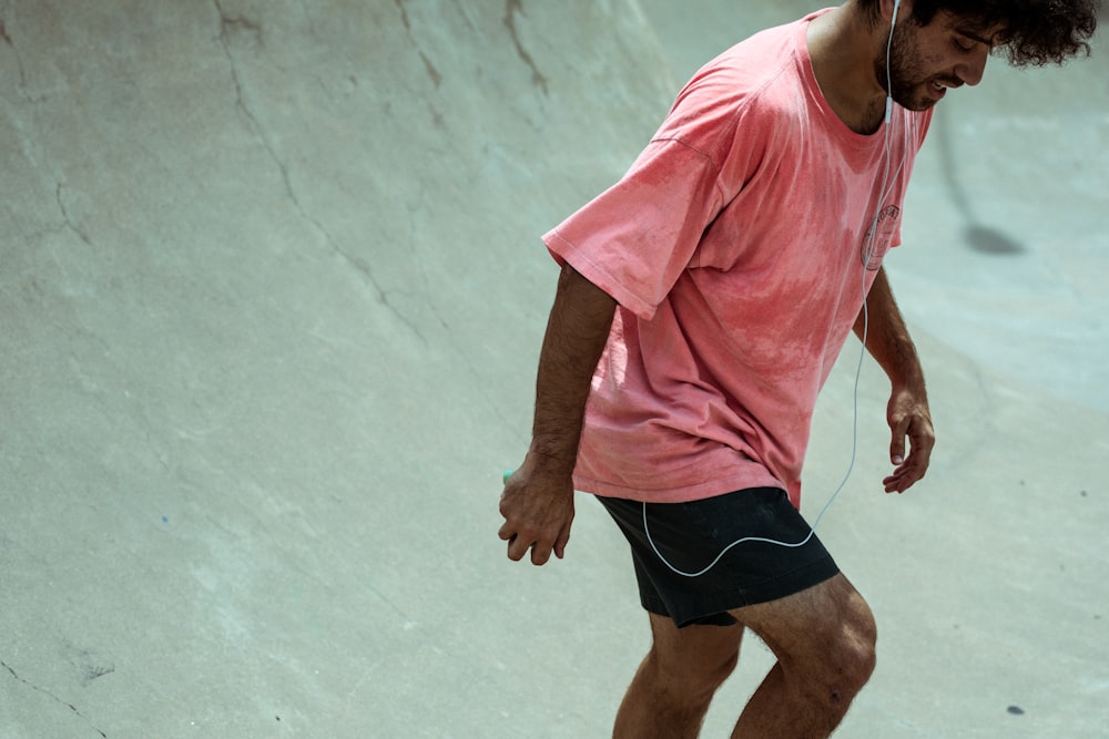 man standing on skateboard track