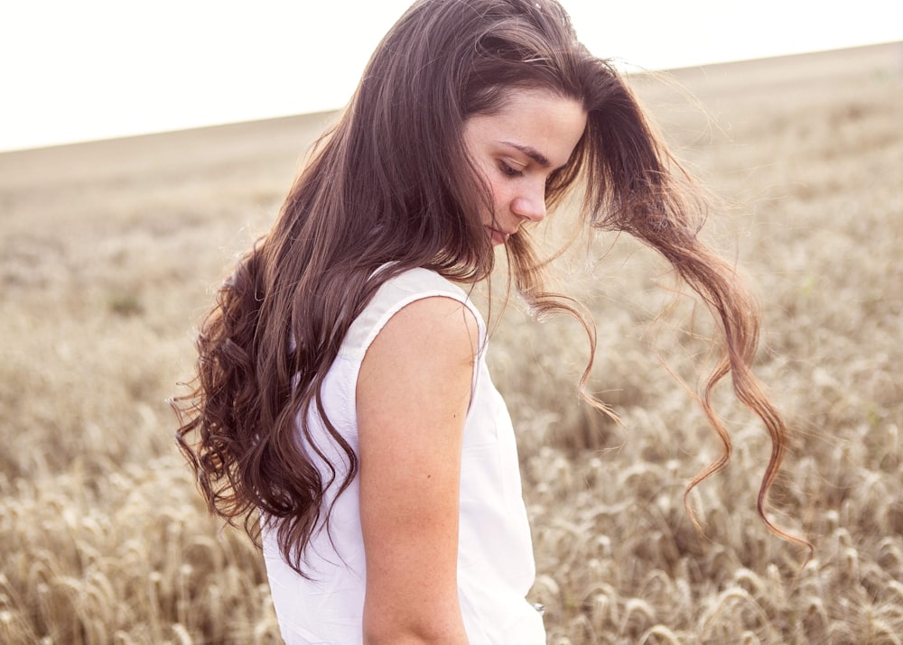 woman standing on grass field