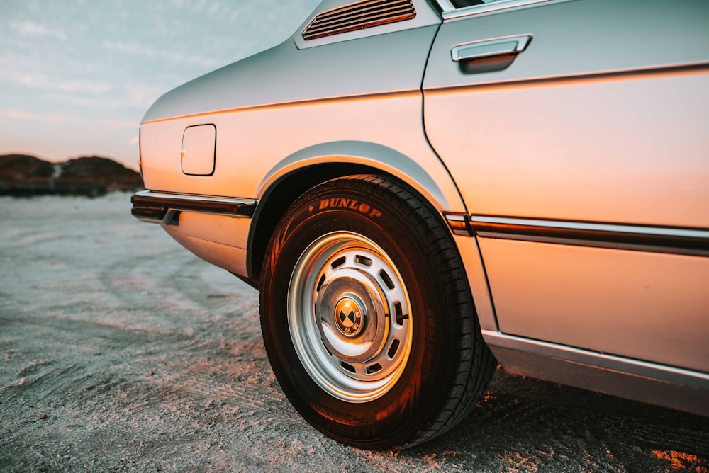 gray vehicle rim with tire