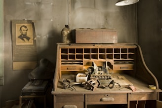 A serene office space with a vintage desk and genealogical documents spread out.