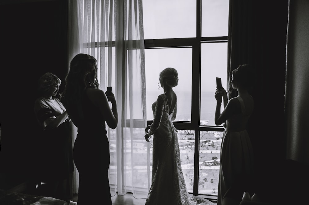 silhouette of woman wearing wedding dress