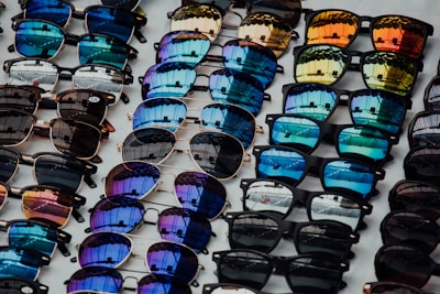 black sunglasses lot on white panel