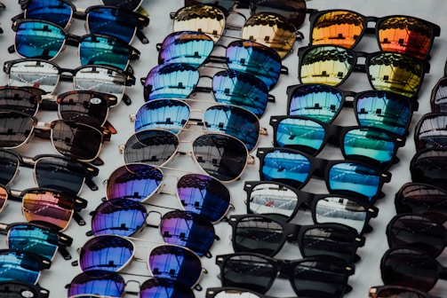 black sunglasses lot on white panel