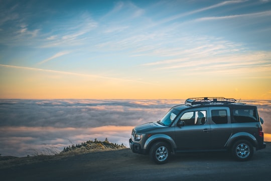 grey SUV beside sea of cloud in Mount Tamalpais United States