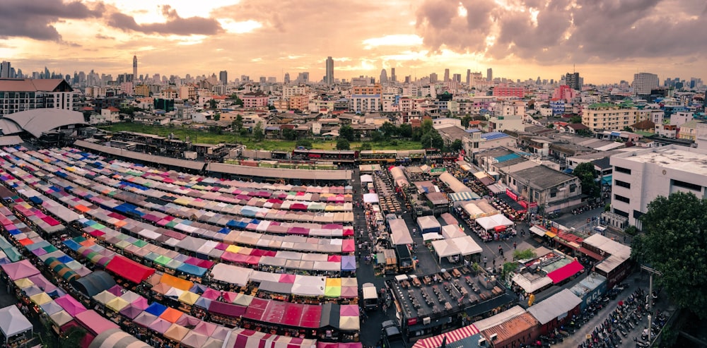 photo of assorted-color buildings under cloudy sky