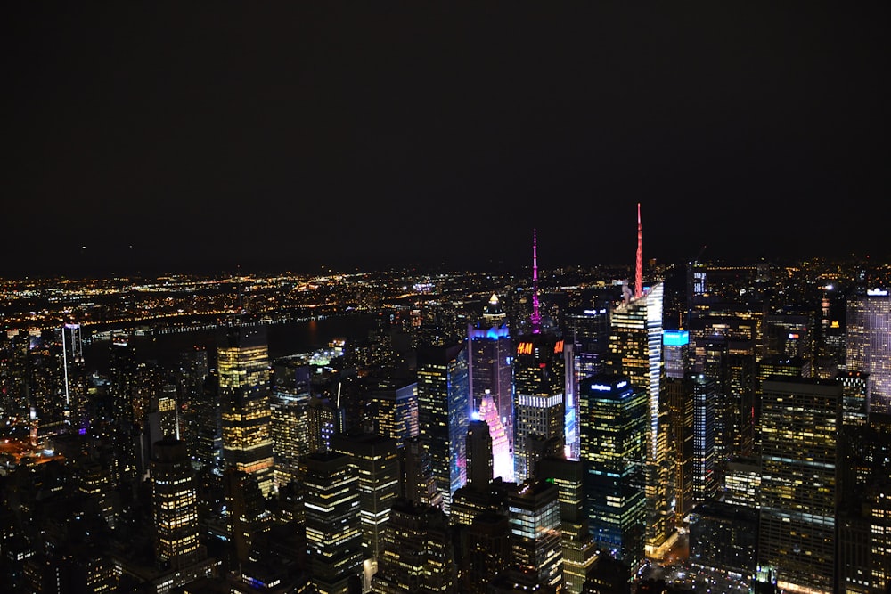 aerial photo of city buildings at night