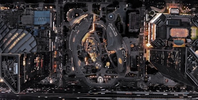 Aerial view of a modern city with digital data overlays.