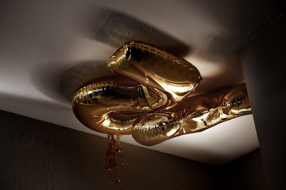 gold balloon on ceiling