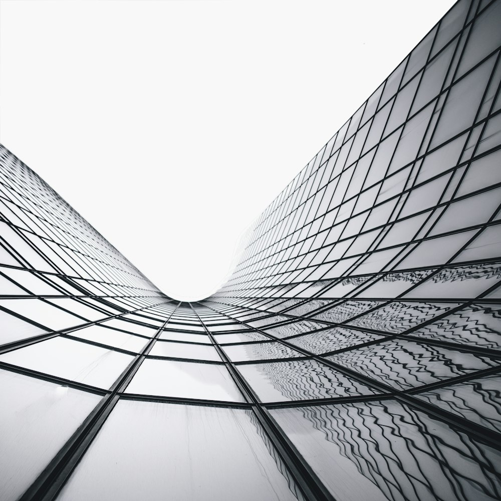 a black and white photo of a very tall building