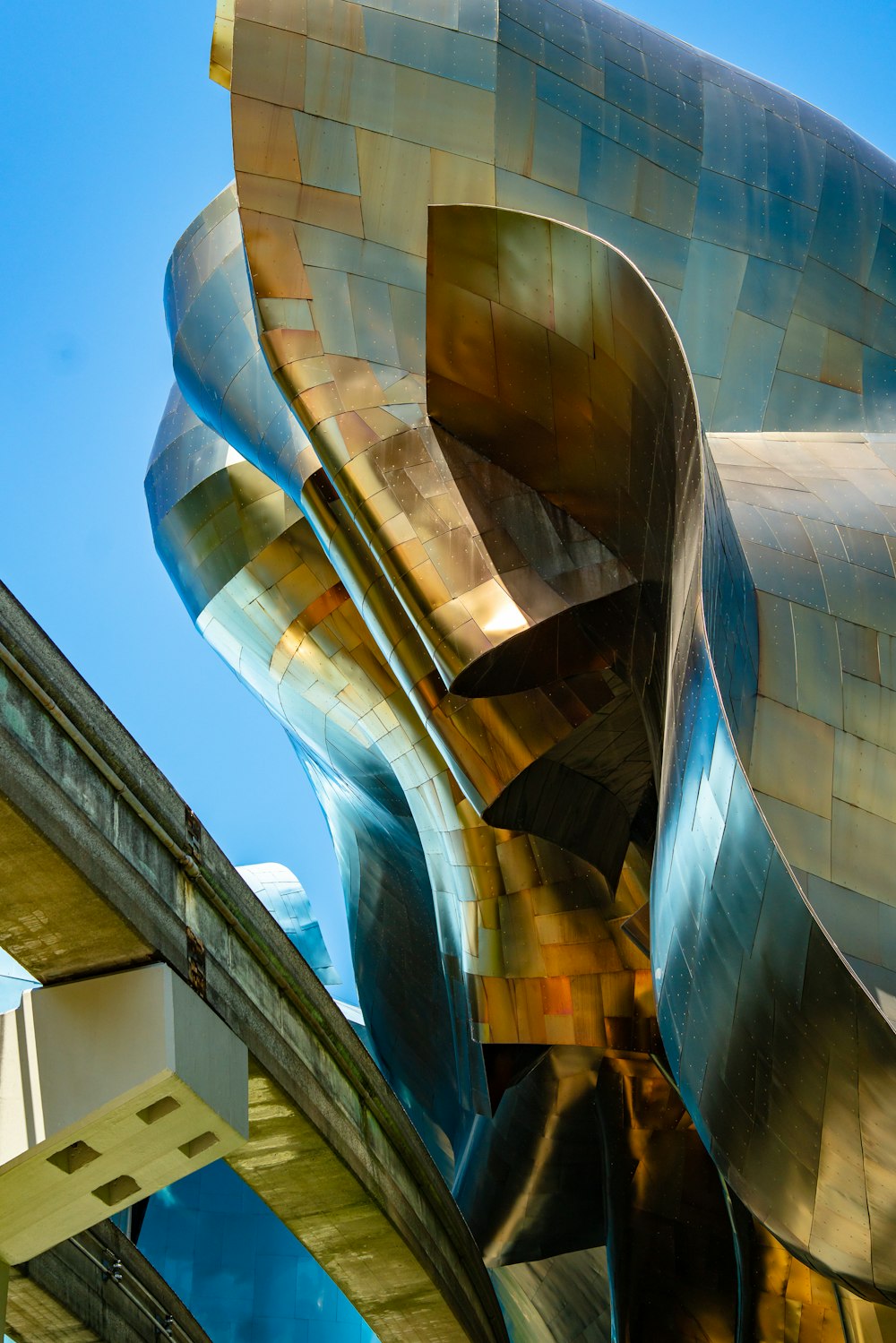 closeup photo of brown and blue concrete buildings