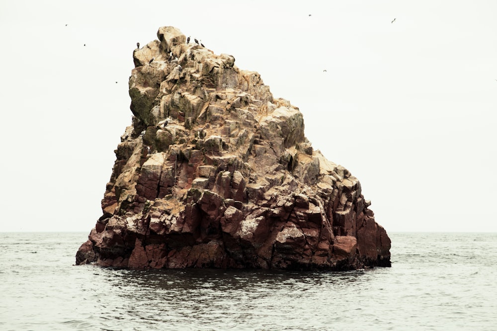 rocky formation near the body of water
