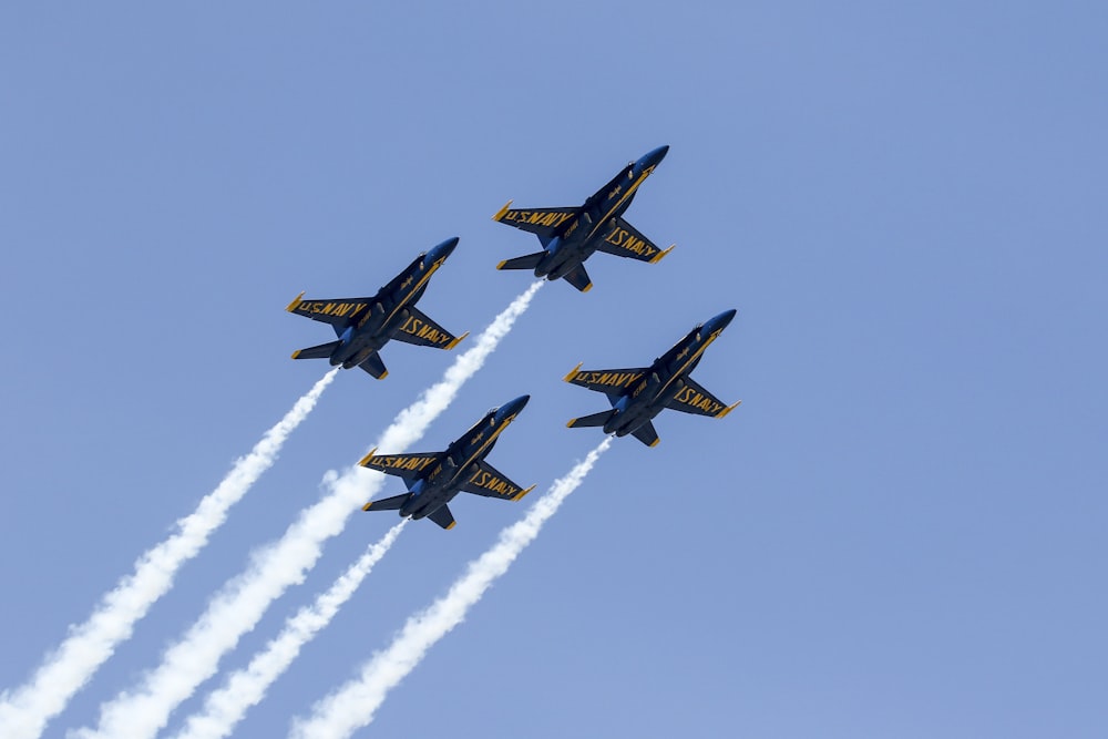 low angle photography of four aircrafts