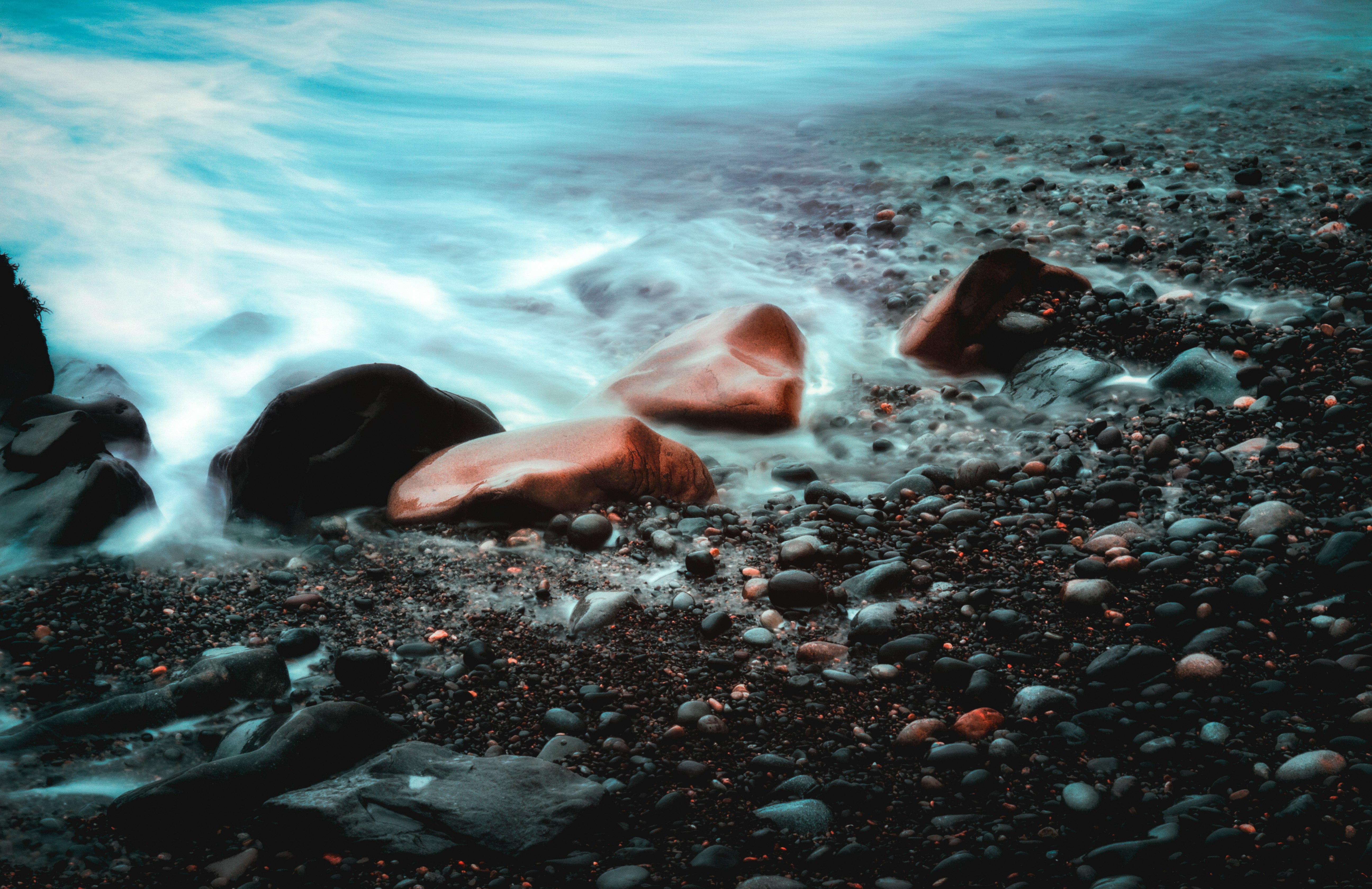macro photography of seashore with rocks
