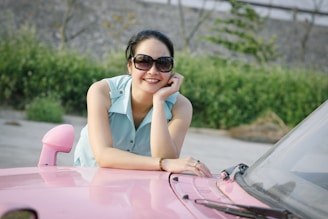 woman wearing blue sleeveless top