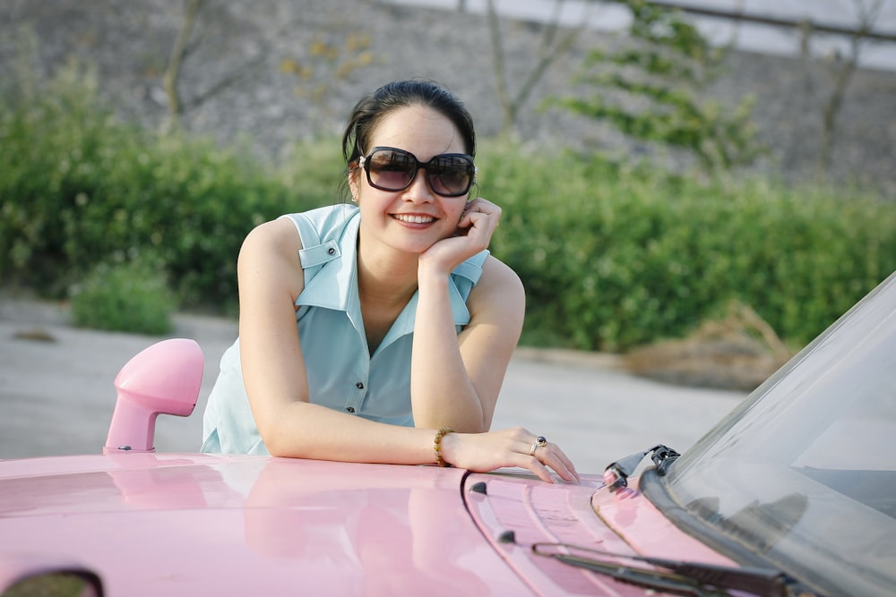 woman wearing blue sleeveless top