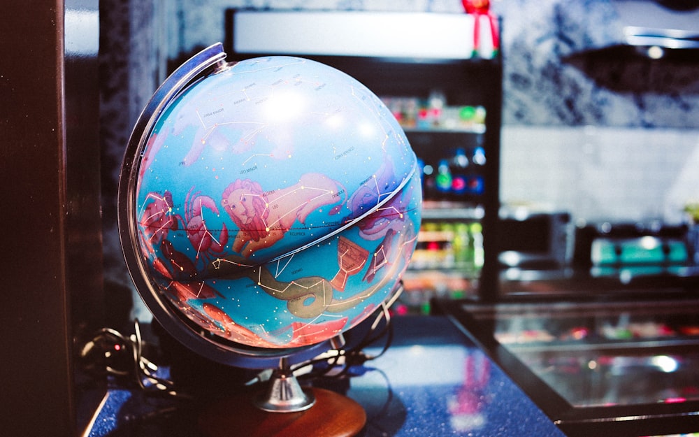 globe desk on table