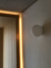 Close-up of sleek interior design with minimalist furniture and ambient lighting.