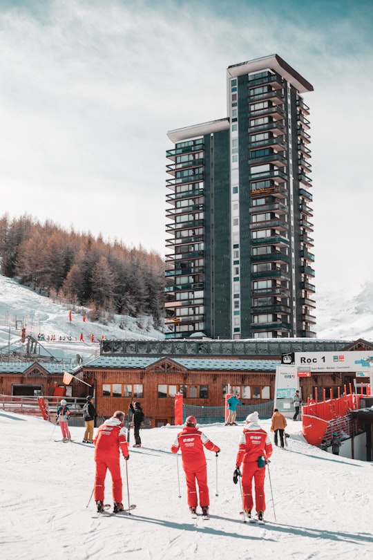 group of people playing snow skis in Les Menuires France