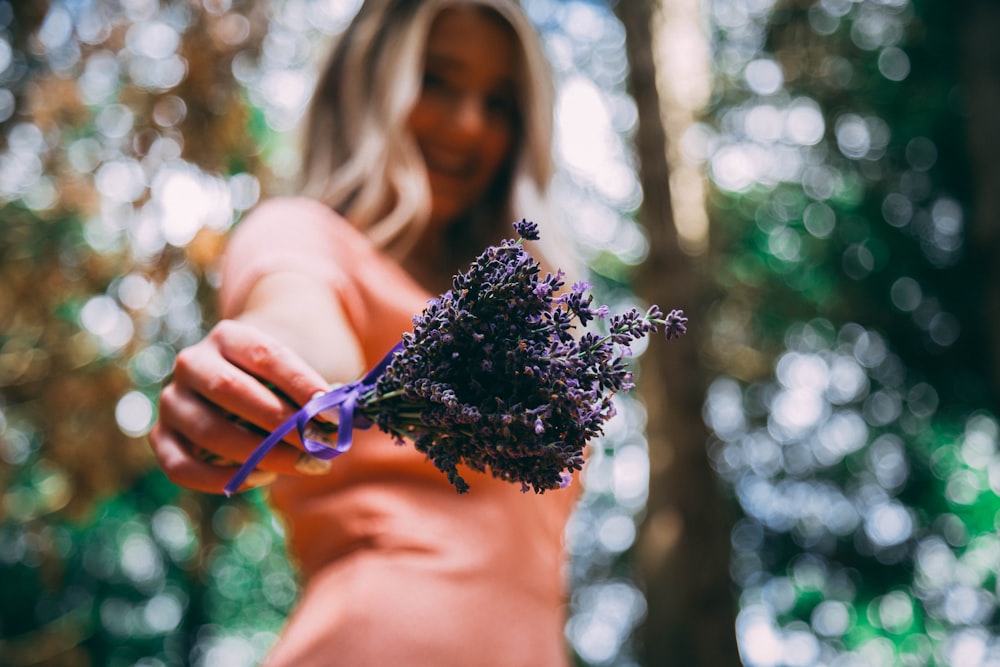 woman holding purple lavender