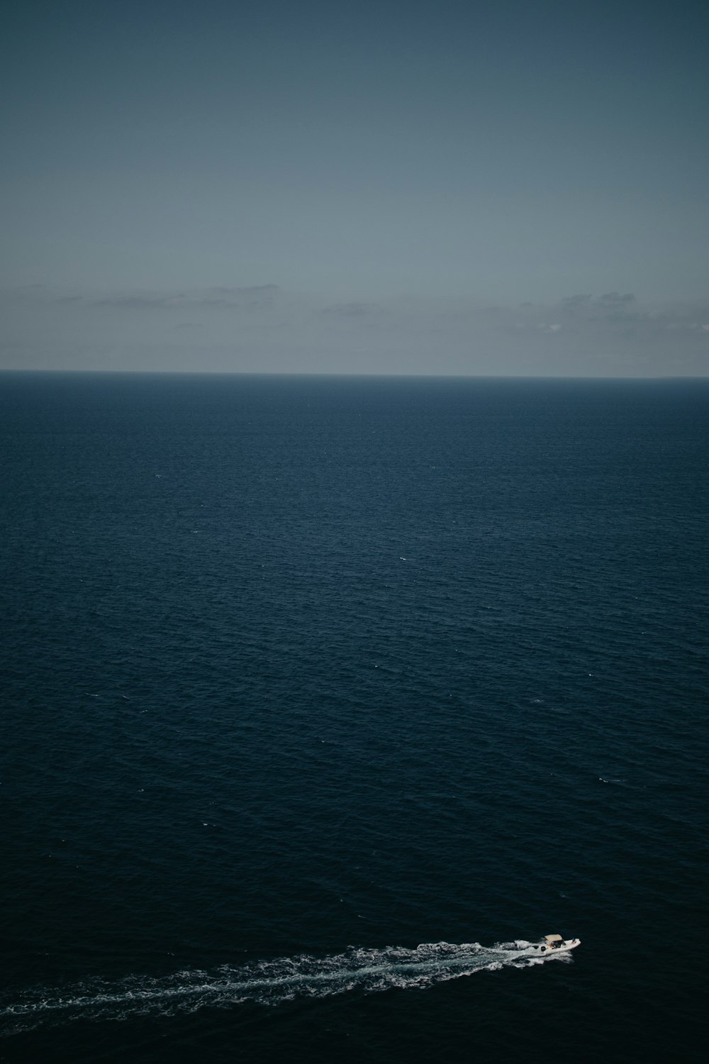 aerial photography sea under blue sky