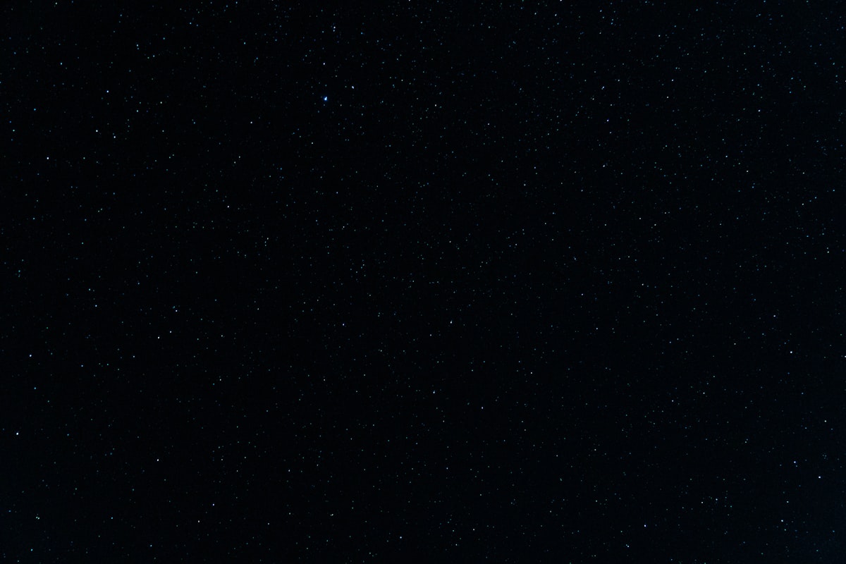 Observatory dome under a star-filled night sky